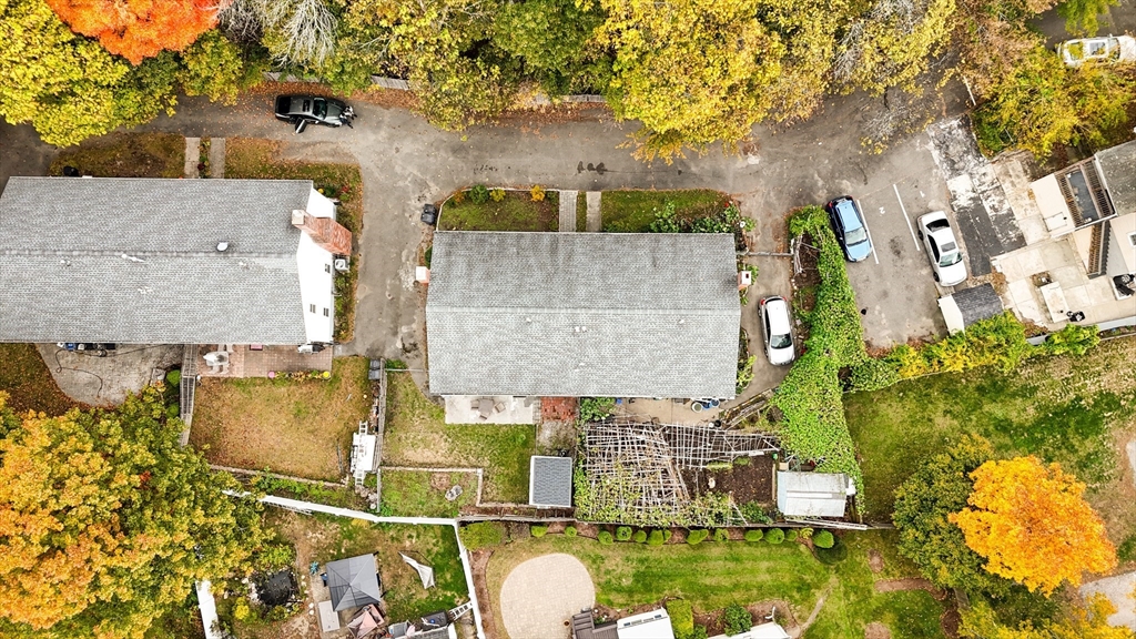 5337 B Washington Street, Unit B Boston, MA 02132 - Photo 41 of 41 an aerial view of a house with a swimming pool