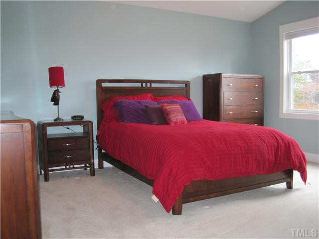 407 Glascock Street Raleigh, NC 27604 - Photo 13 of 25 Large Master Bedroom with charming colors, natural light and a view of the wooded backyard. Master Bedroom