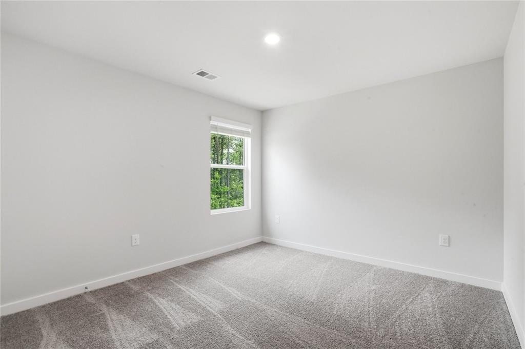 5351 Tolar Road South Fulton, GA 30213 - Photo 20 of 30 an empty room with a window