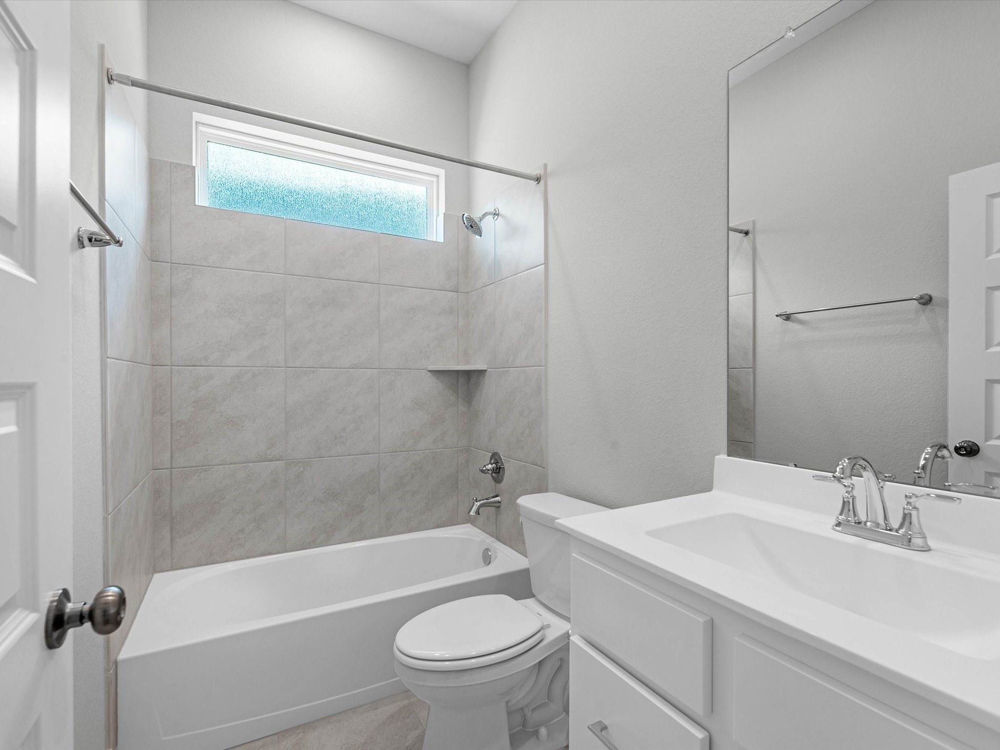 17242 Gleeful Street Hockley, TX 77447 - Photo 14 of 22 a bathroom with a sink toilet and shower