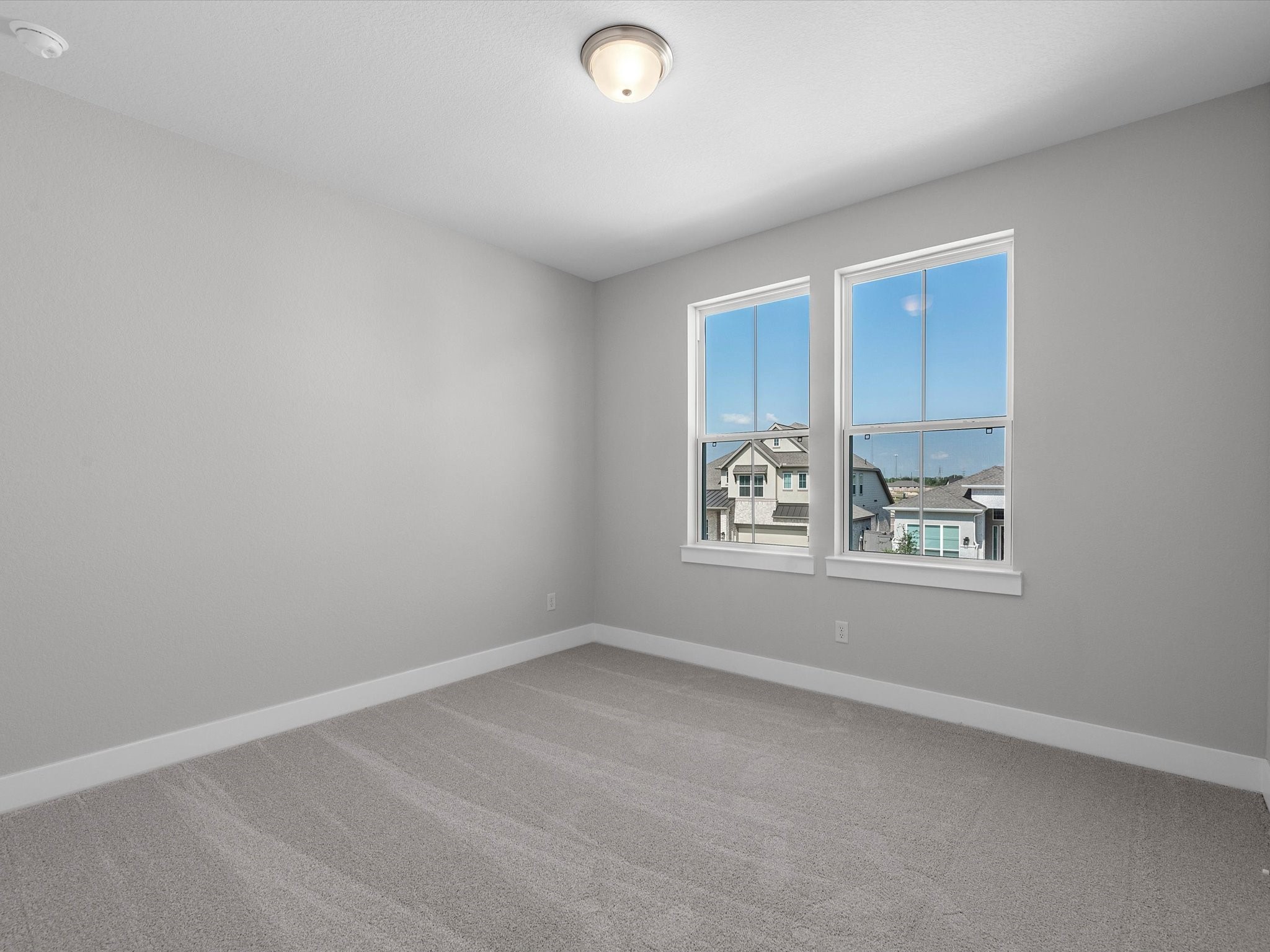 17242 Gleeful Street Hockley, TX 77447 - Photo 17 of 22 an empty room with windows