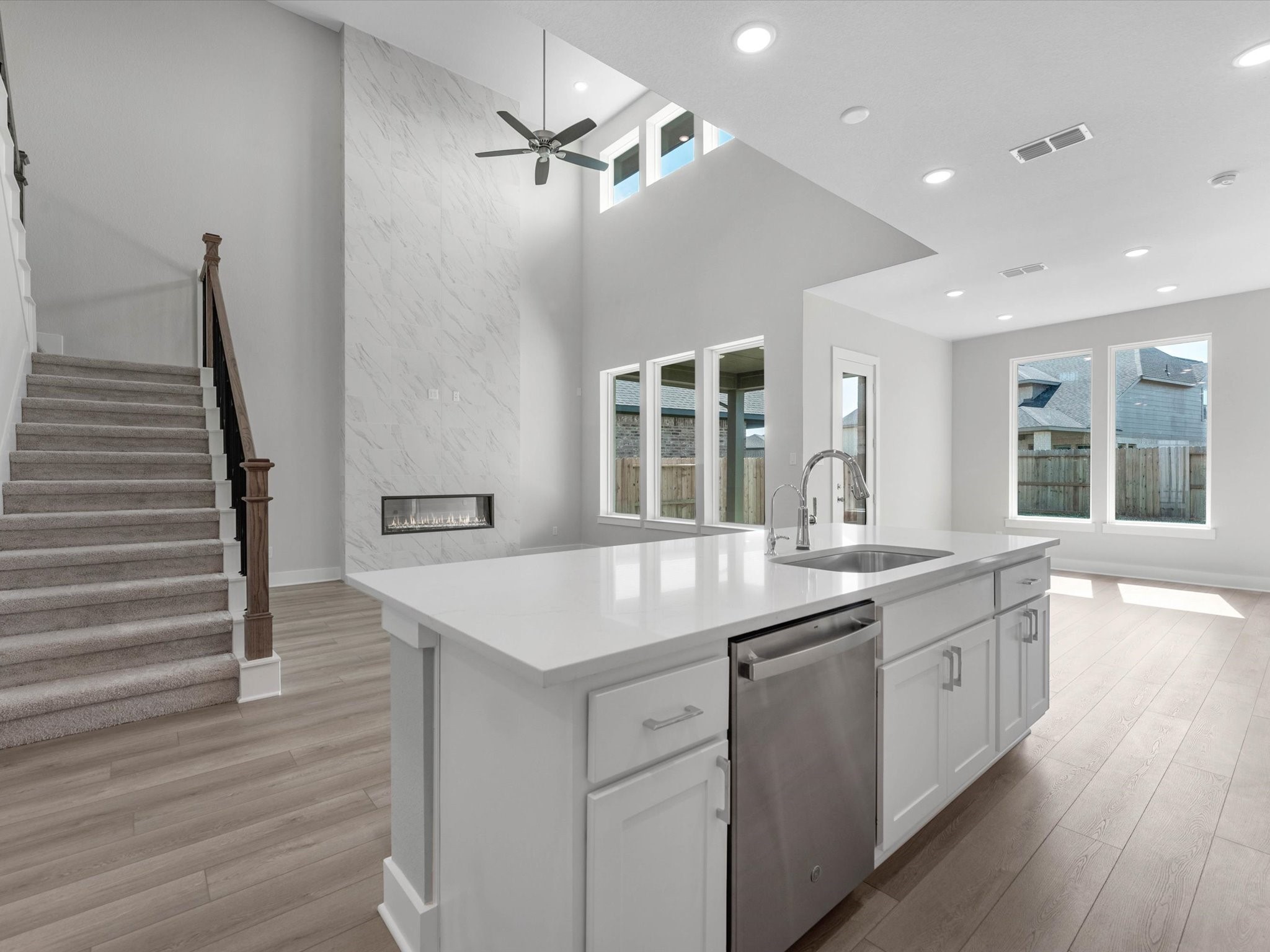 17242 Gleeful Street Hockley, TX 77447 - Photo 4 of 22 a kitchen with sink stove and refrigerator