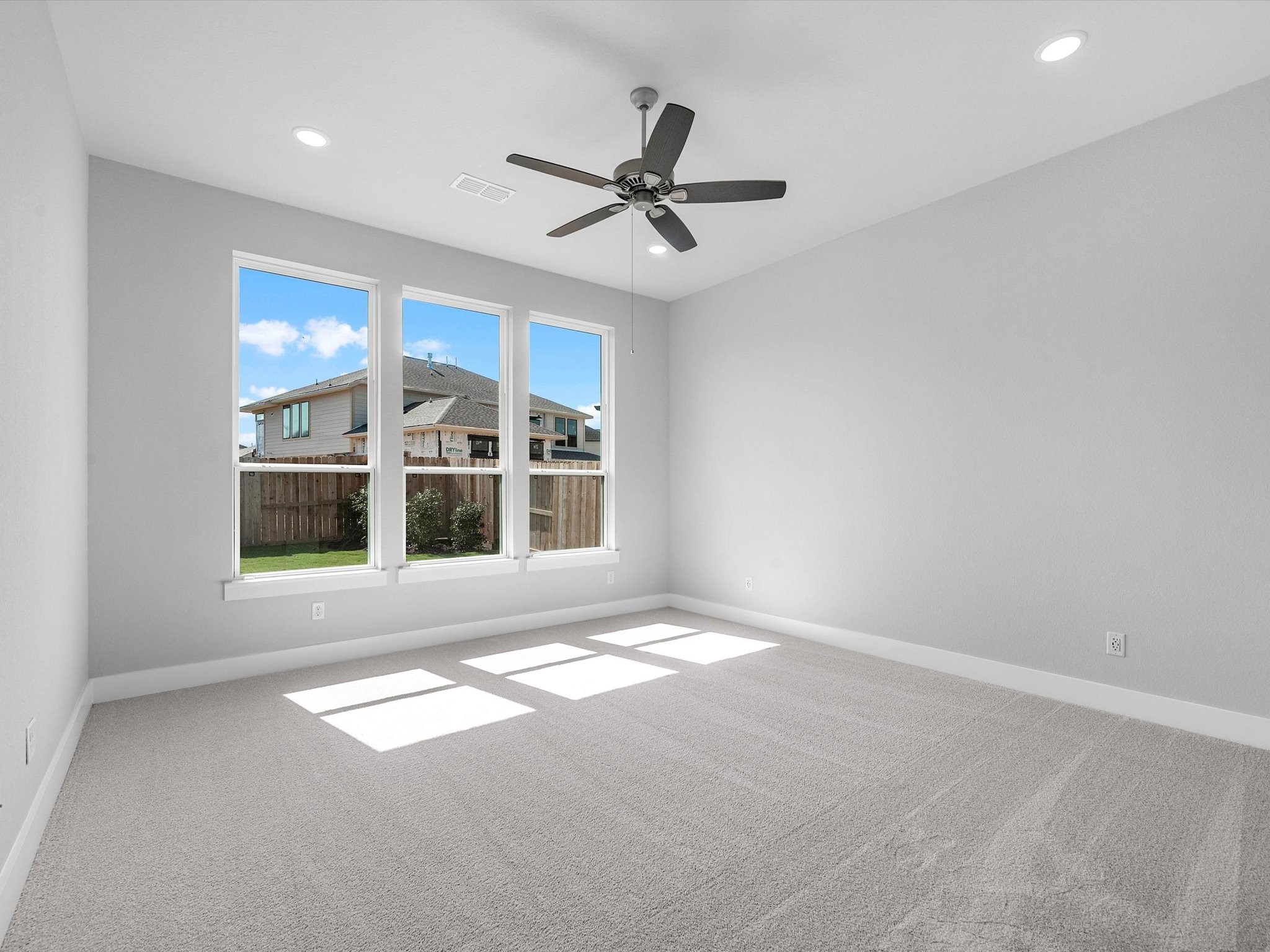 17242 Gleeful Street Hockley, TX 77447 - Photo 10 of 22 a view of an empty room with a window