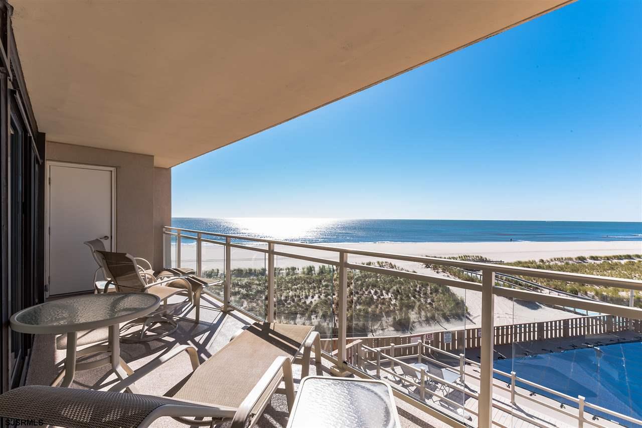 2700 Atlantic Avenue, Unit 419 Longport, NJ 08403 - Photo 13 of 32 a balcony with table and chairs
