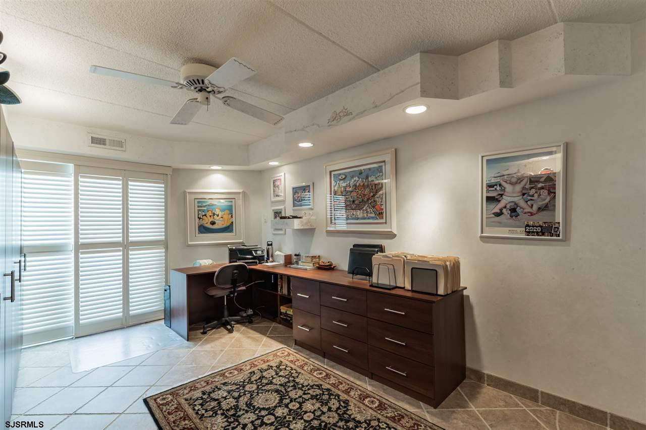 2700 Atlantic Avenue, Unit 419 Longport, NJ 08403 - Photo 15 of 32 a view of a workspace with furniture and a window