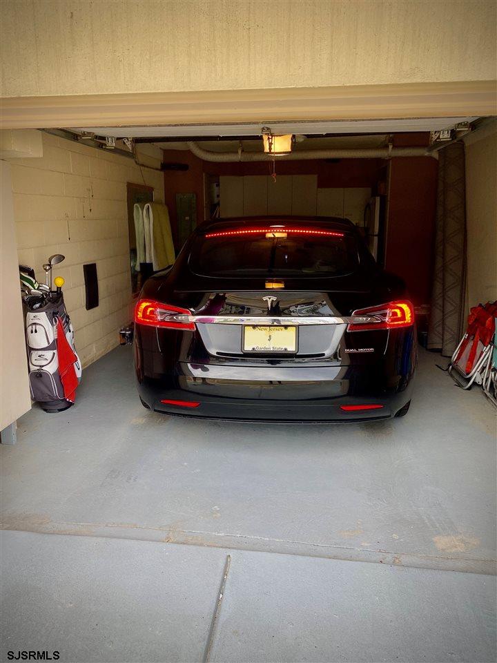 2700 Atlantic Avenue, Unit 419 Longport, NJ 08403 - Photo 23 of 32 a car parked in a garage