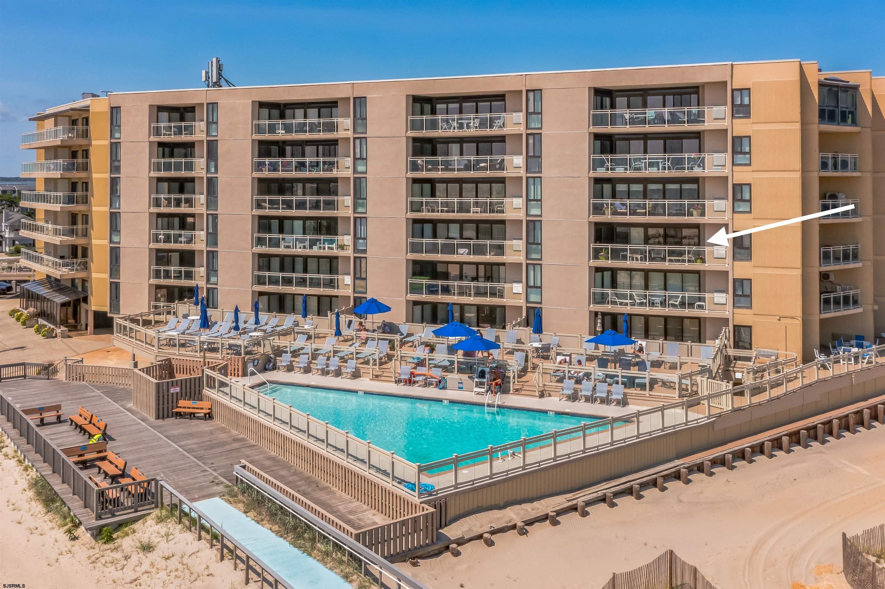 2700 Atlantic Avenue, Unit 419 Longport, NJ 08403 - Photo 3 of 32 a front view of a building with glass windows