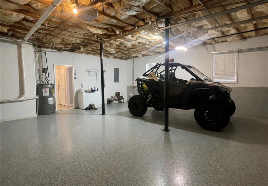 132 Sydney Summit Villa Rica, GA 30180 - Photo 16 of 20 a view of a car in garage