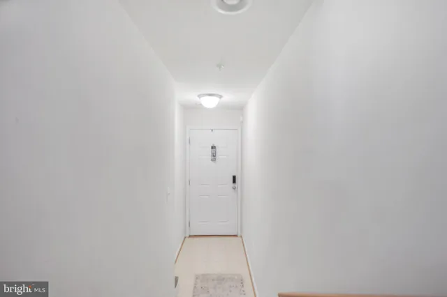 a view of a house with backyard porch and sitting area