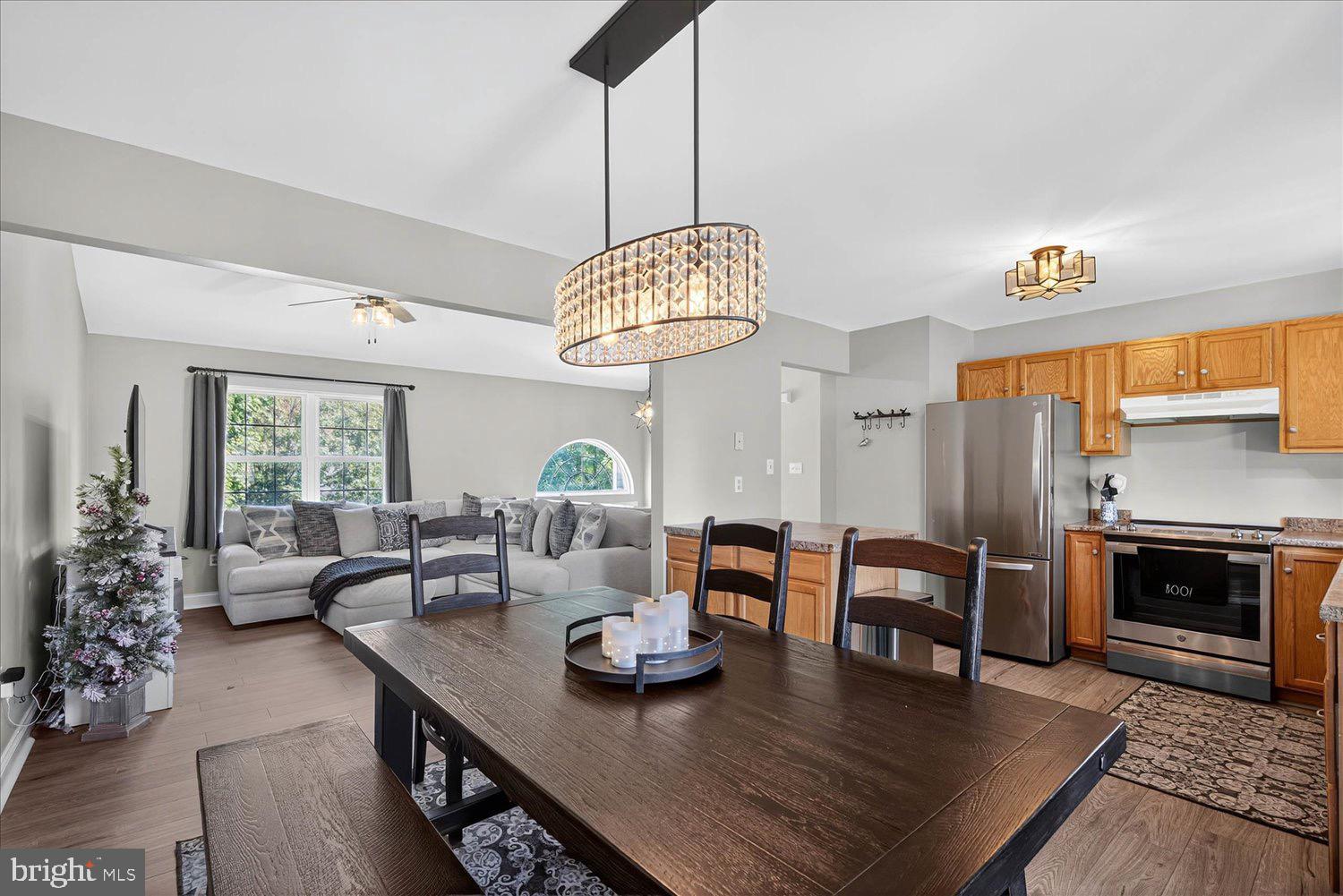 554 Mallard Drive Manheim, PA 17545 - Photo 5 of 21 a living room with furniture dining table and a fireplace
