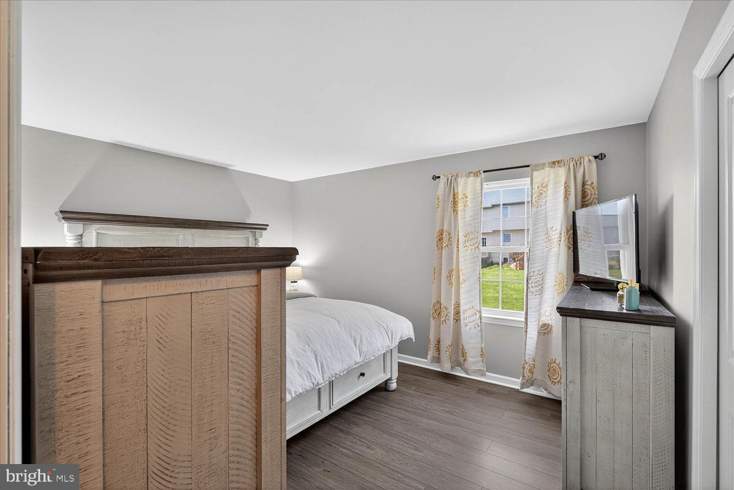 554 Mallard Drive Manheim, PA 17545 - Photo 9 of 21 a bedroom with a bed and a flat screen tv