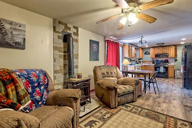 a backyard of a house with outdoor seating