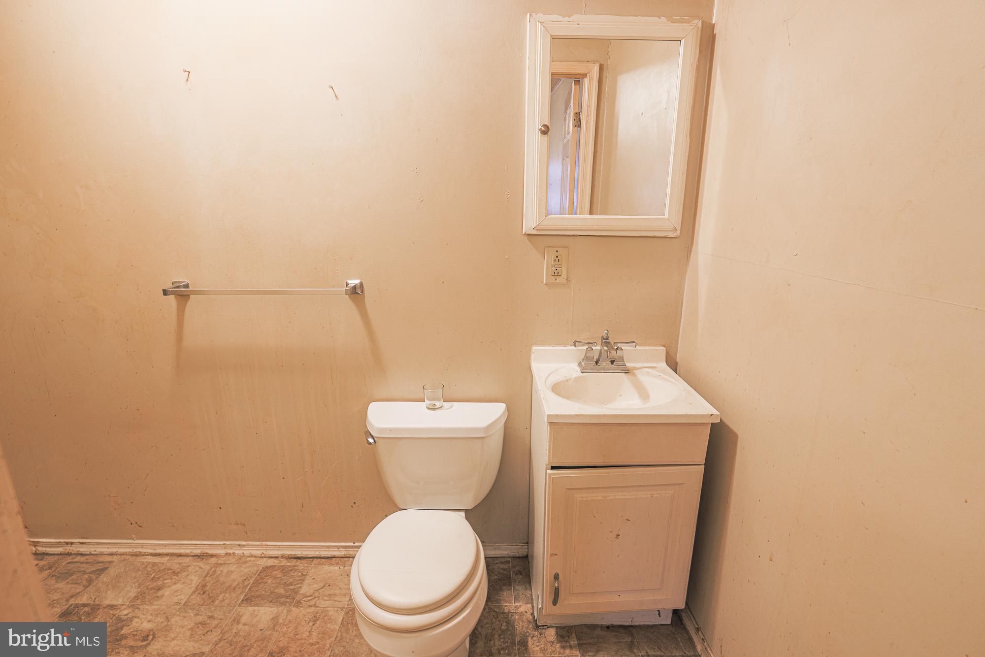 633 North Brice Street Baltimore, MD 21217 - Photo 11 of 28 Compact bathroom with essential fixtures.