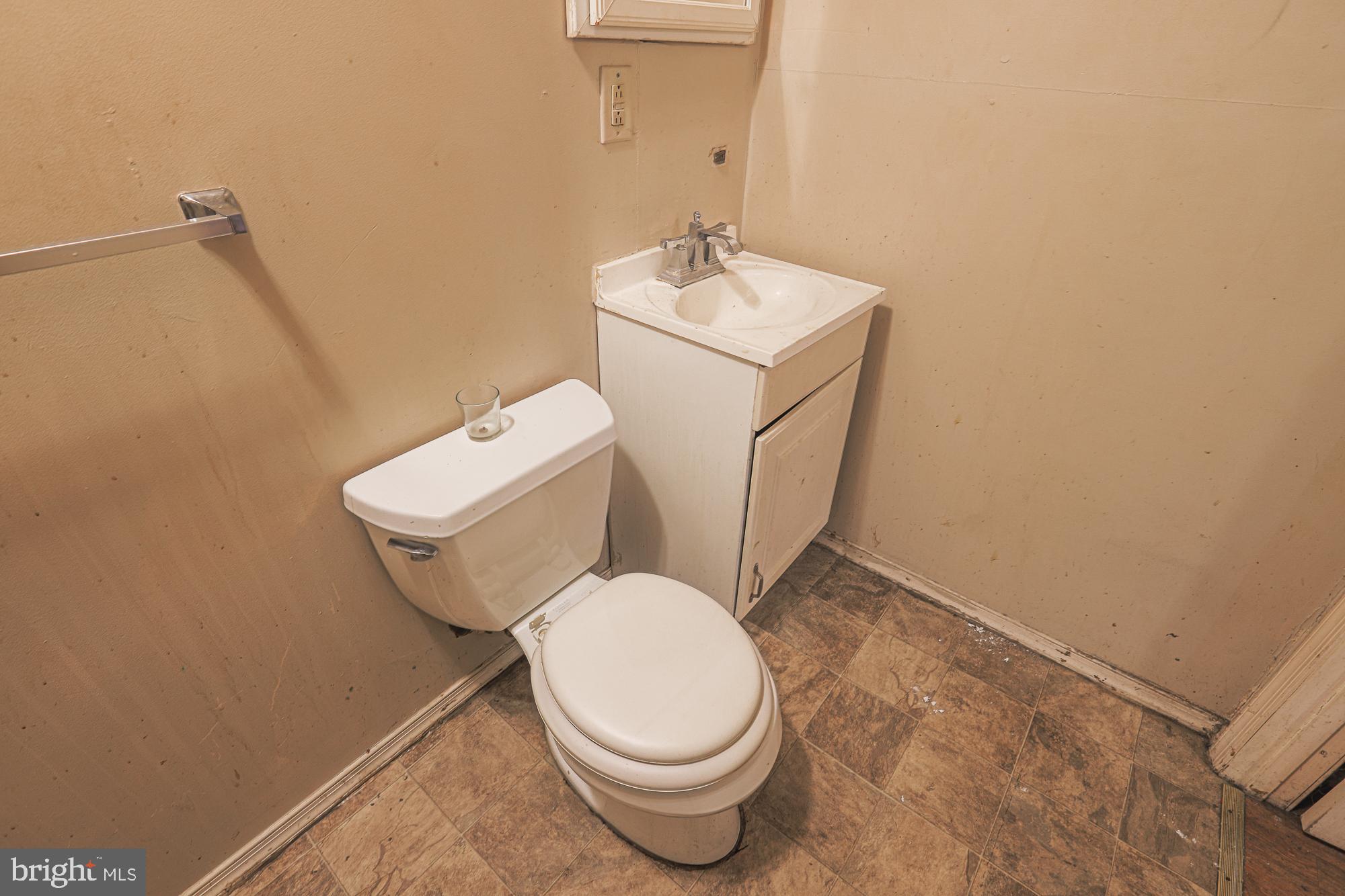 633 North Brice Street Baltimore, MD 21217 - Photo 12 of 28 Compact bathroom with essential fixtures.