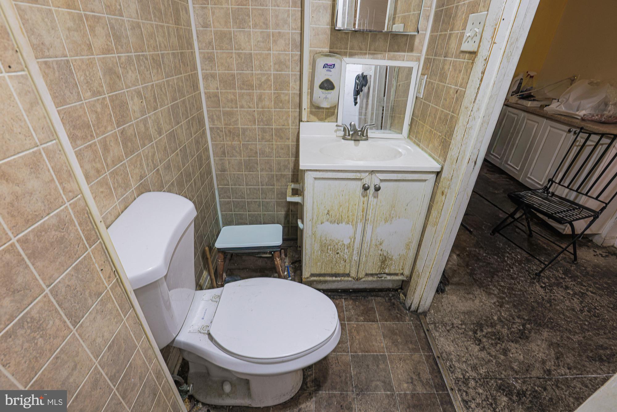 633 North Brice Street Baltimore, MD 21217 - Photo 23 of 28 Charming vintage bathroom with rustic appeal.