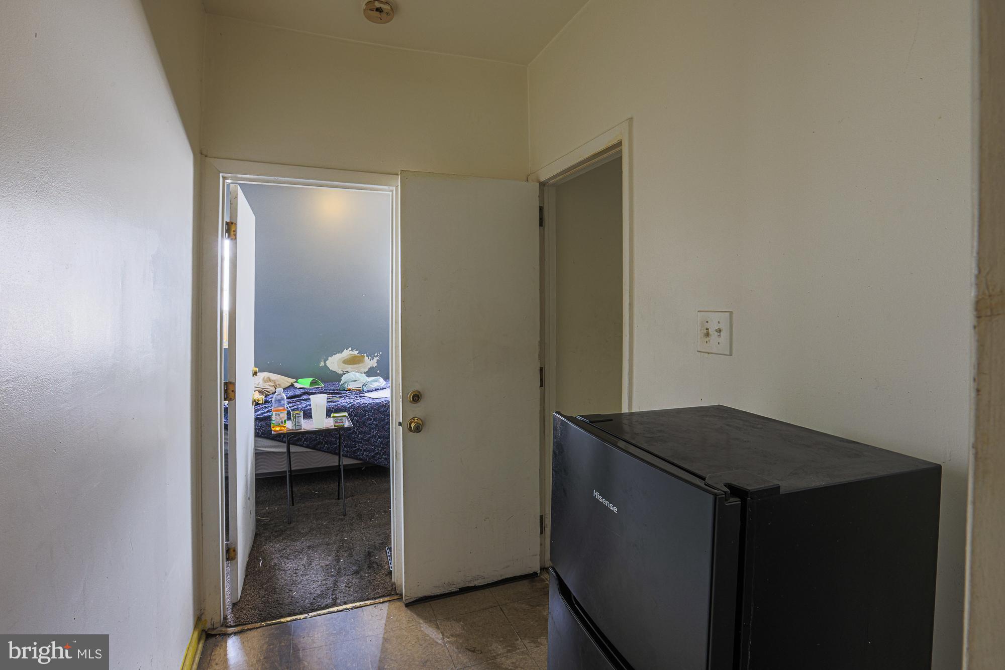 633 North Brice Street Baltimore, MD 21217 - Photo 27 of 28 Cozy entryway leading to a serene bedroom.