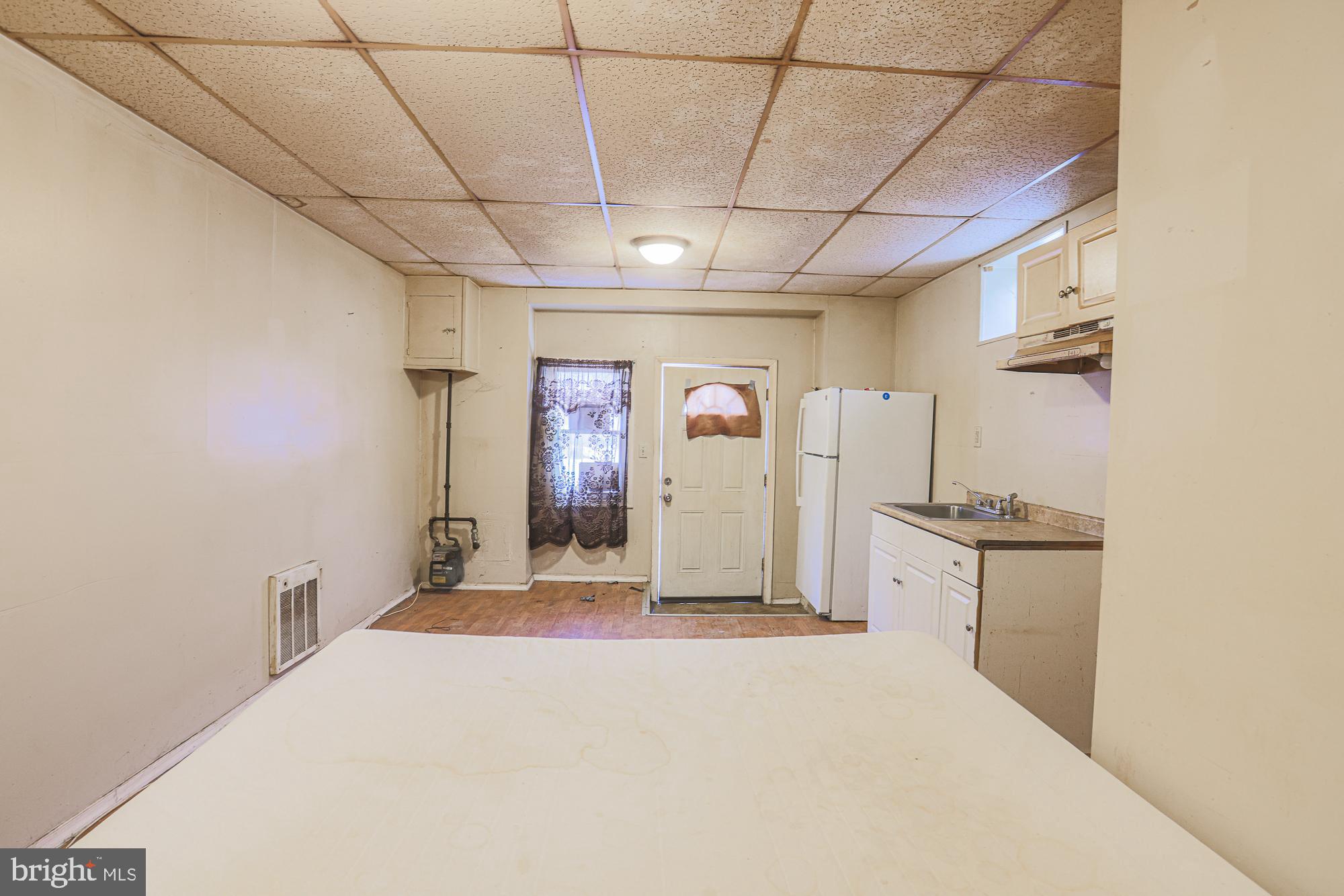 633 North Brice Street Baltimore, MD 21217 - Photo 10 of 28 Cozy kitchen space with inviting entrance.