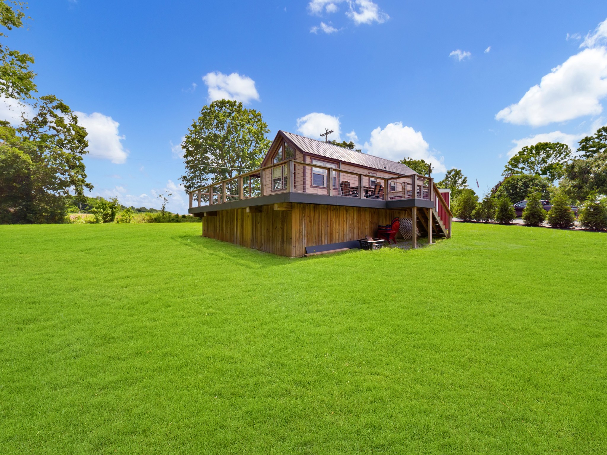 a view of a house with a big yard