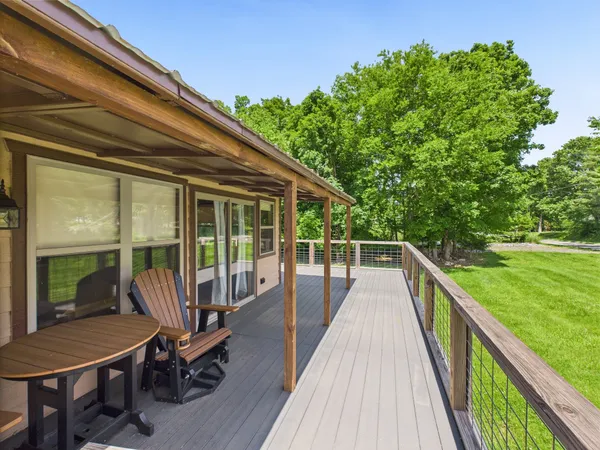 a backyard of a house with lots of green space