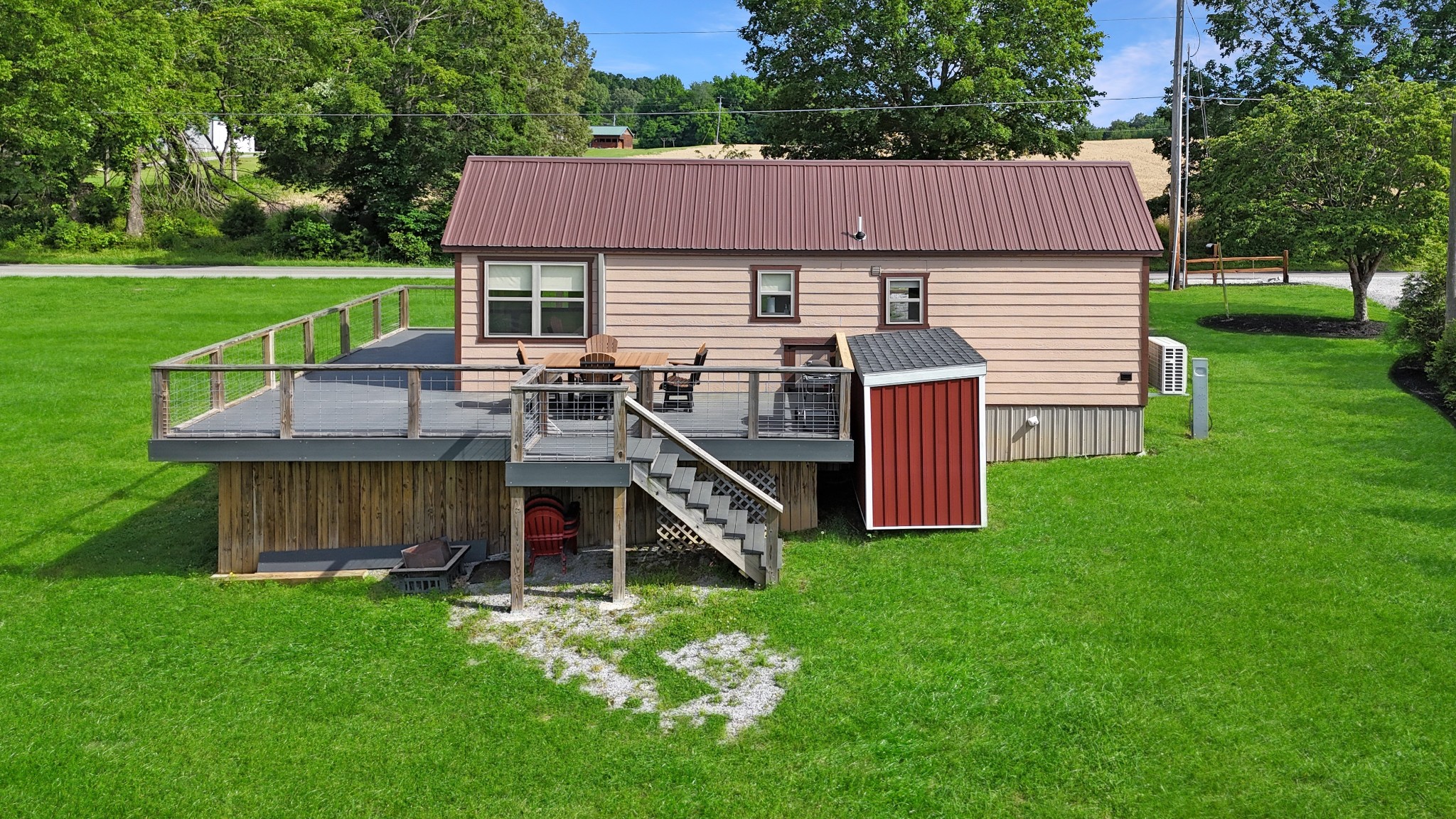 836 Prizer Point Road Cadiz, KY 42211 - Photo 64 of 82 a view of a house with a yard and sitting area