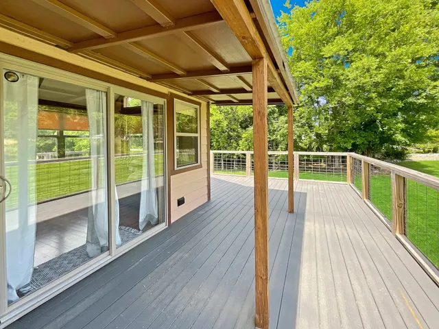 a view of a living room and a flat screen tv