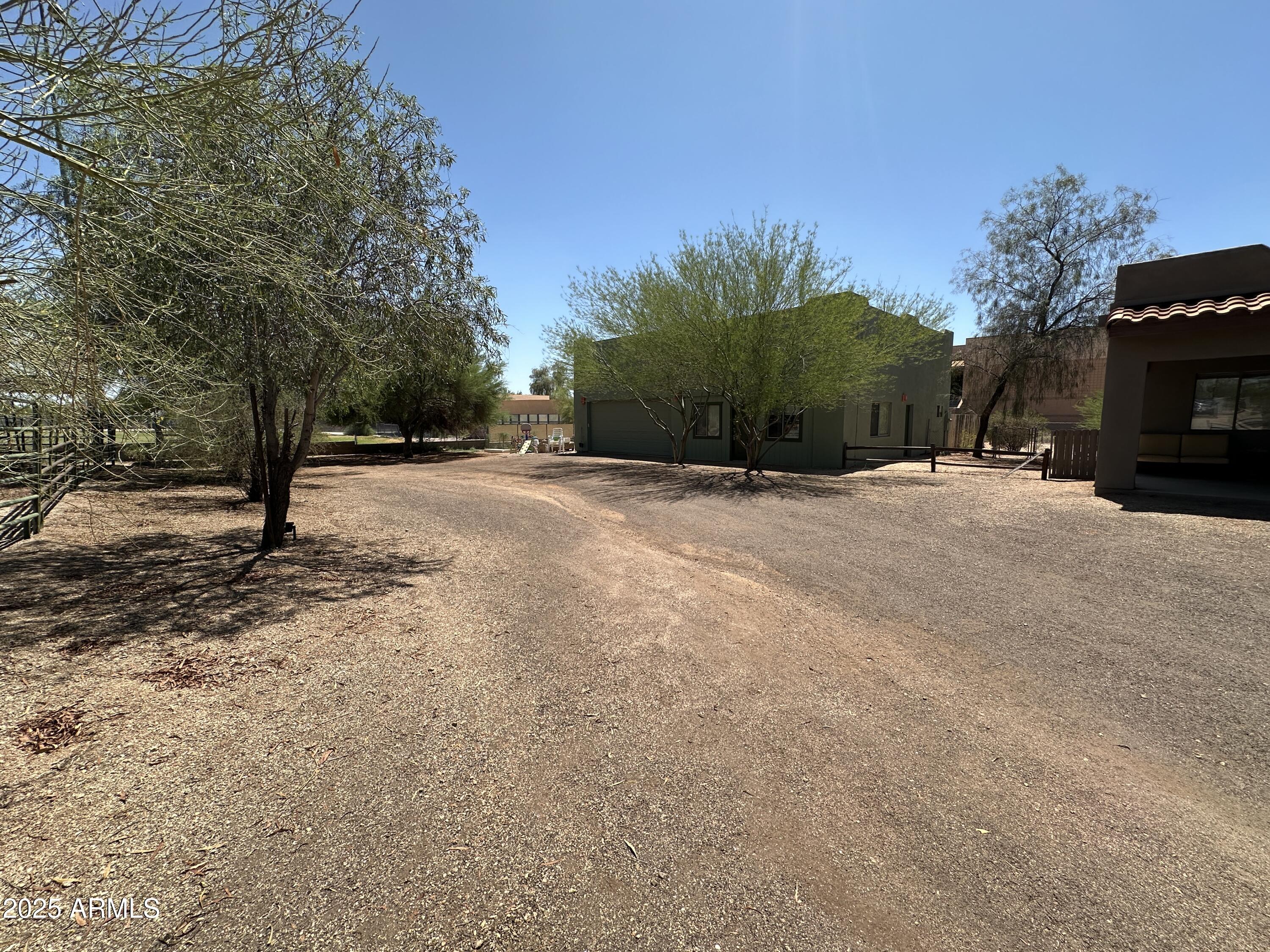 30814 North Sunrise Ranch Road, Unit GUEST Cave Creek, AZ 85331 - Photo 8 of 9 a view of road and trees