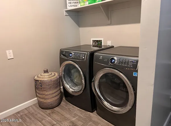 a utility room with dryer and washer