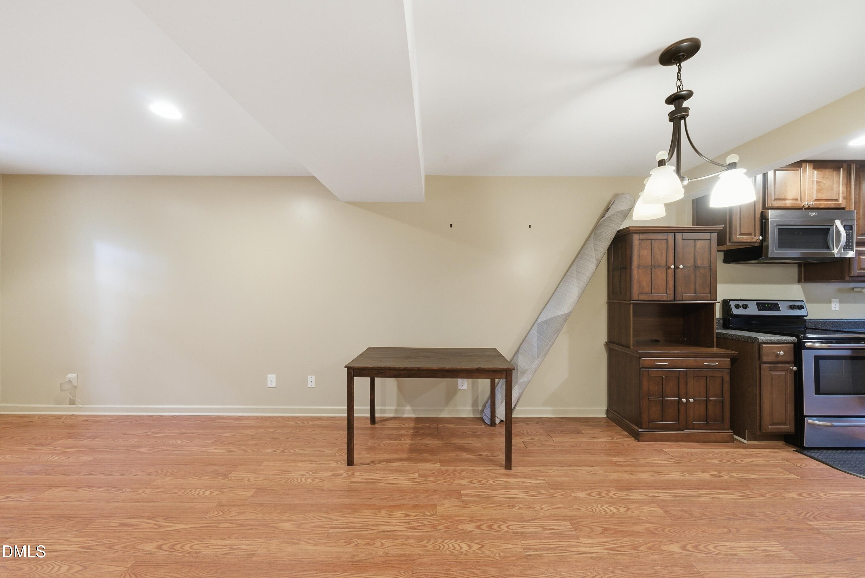 6355 New Market Way Raleigh, NC 27615 - Photo 15 of 30 a view of an empty room with a window
