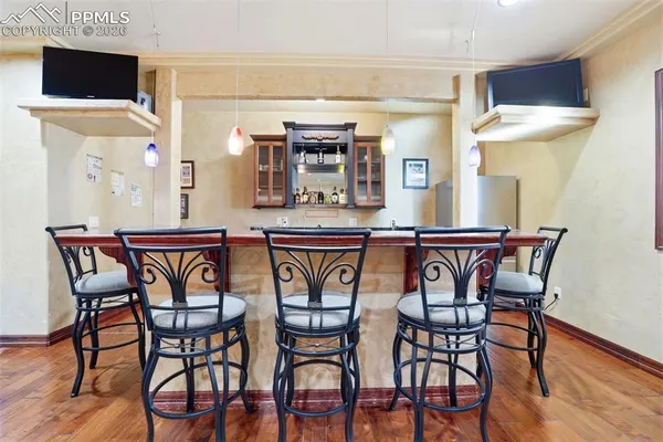 a lobby with furniture and rug