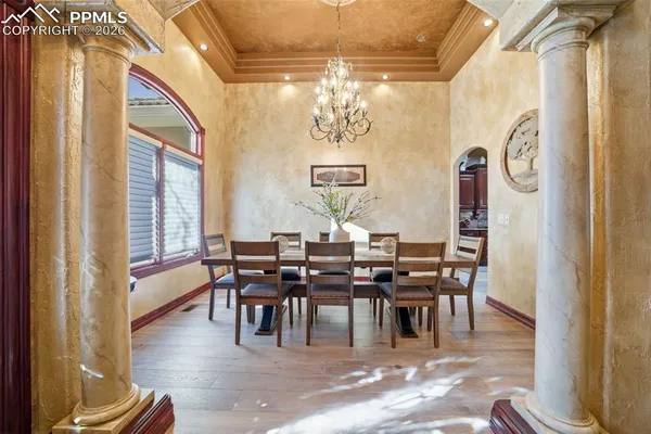a view of a dining room with furniture window and outside view