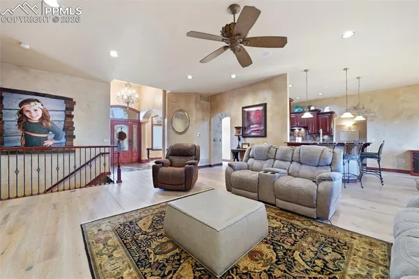a living room with furniture and a rug
