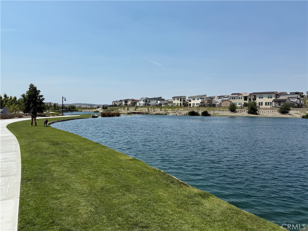 541 Jasper Street Rancho Mission Viejo, CA 92694 - Photo 18 of 20 a view of a lake with houses in the back