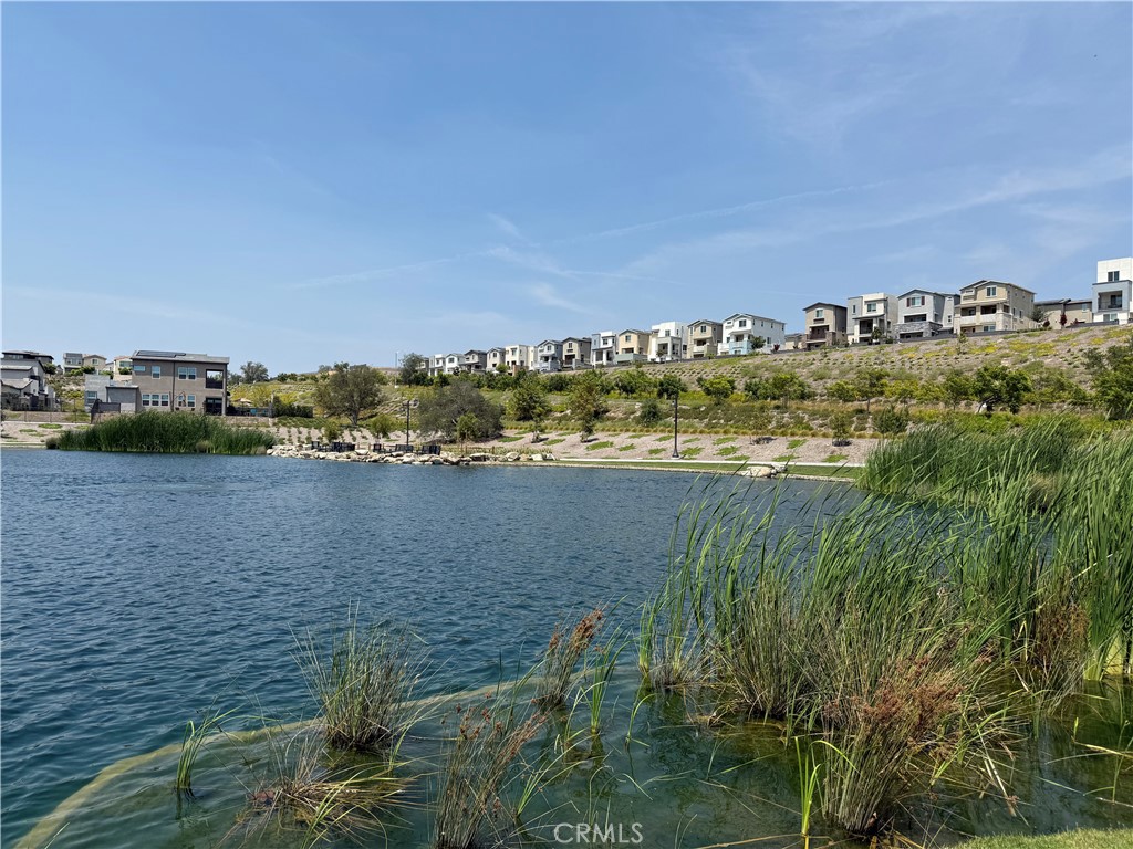 541 Jasper Street Rancho Mission Viejo, CA 92694 - Photo 19 of 20 a view of a lake with a city