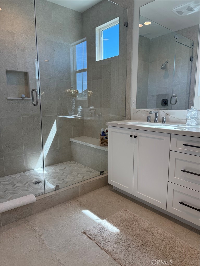 541 Jasper Street Rancho Mission Viejo, CA 92694 - Photo 8 of 20 a bathroom with a sink and a mirror