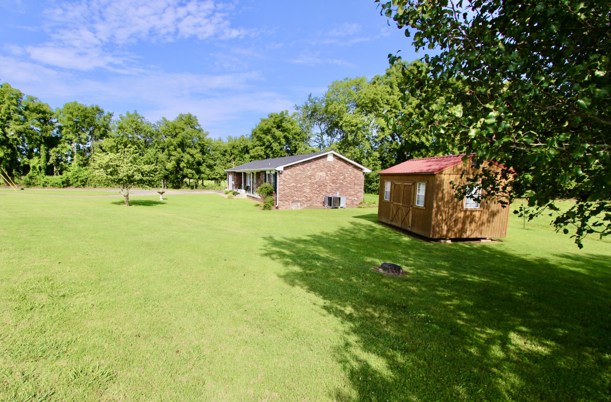 934 Maple Hill Road Lebanon, TN 37087 - Photo 2 of 9 a aerial view of a house with yard and lake view