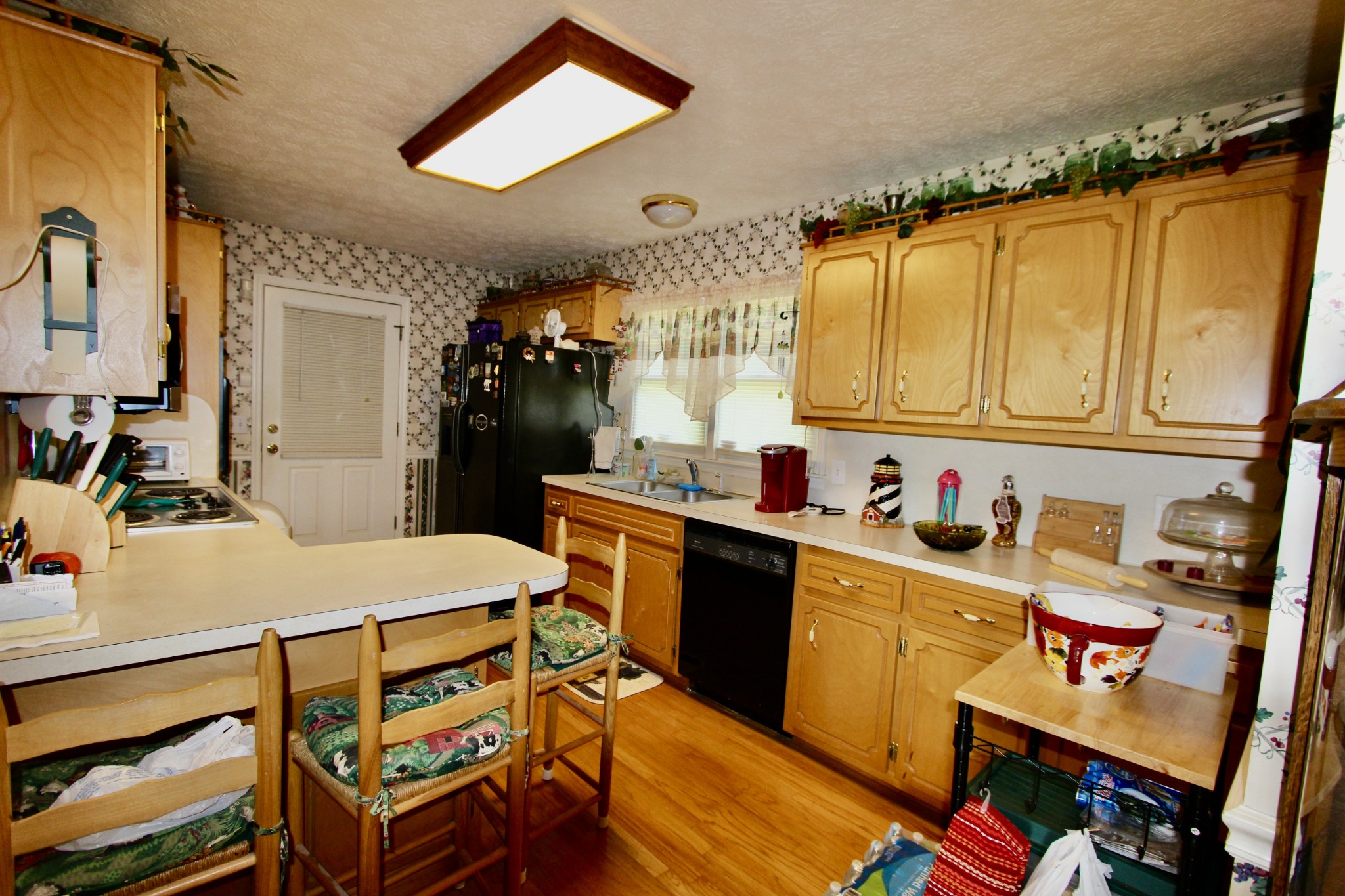 934 Maple Hill Road Lebanon, TN 37087 - Photo 4 of 9 a kitchen with a sink appliances and cabinets