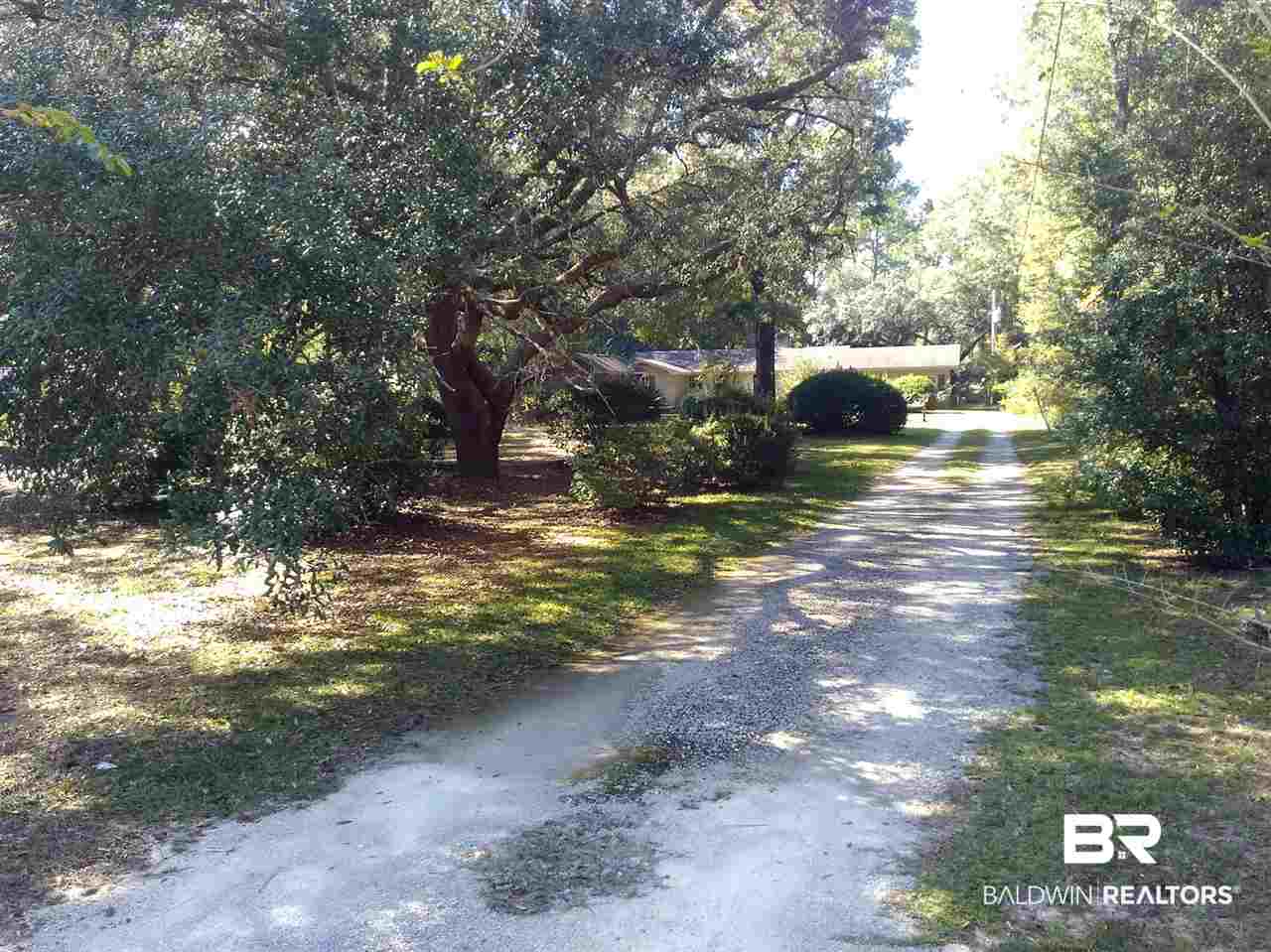 8189 River Road North Foley, AL 36535 - Photo 2 of 50 Long drive takes you to relaxing setting.