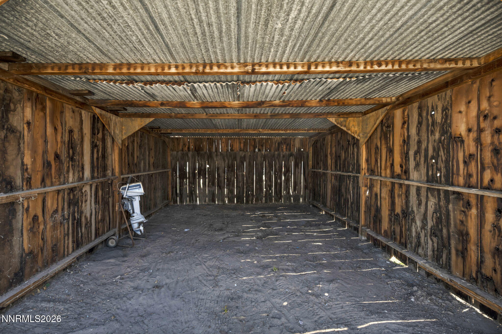 5250 Stillwater Road Fallon, NV 89406 - Photo 41 of 53 a view of an empty room with wooden walls