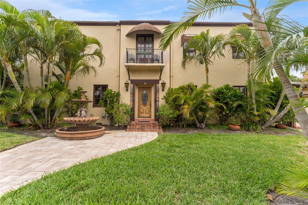 1500 Maple Street Clearwater, FL 33755 - Photo 12 of 96 a front view of a house with garden