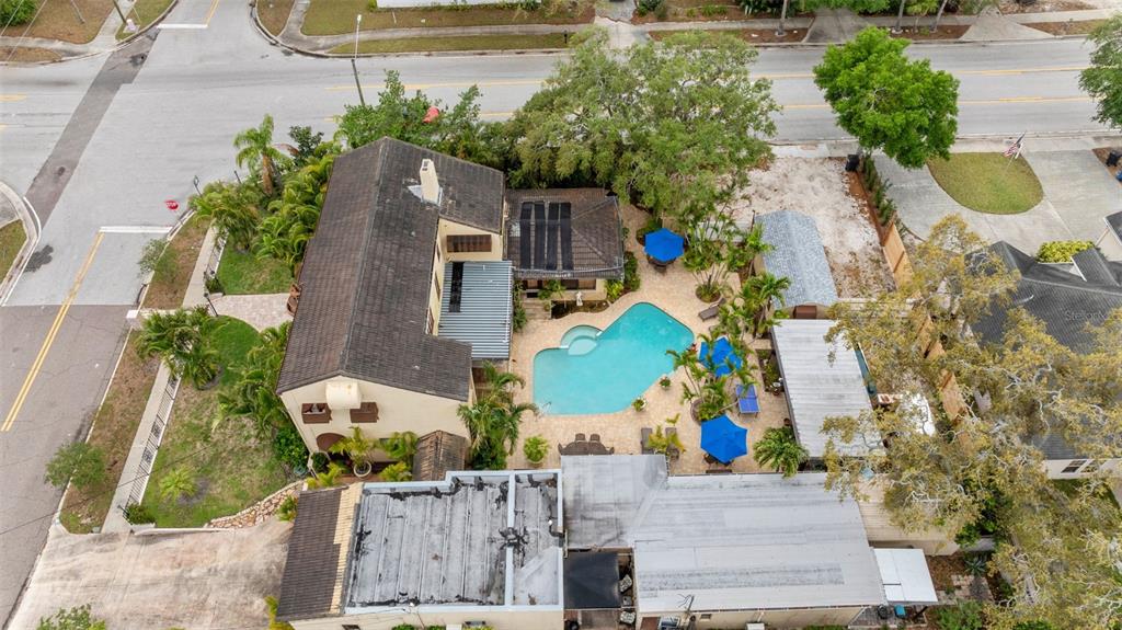 1500 Maple Street Clearwater, FL 33755 - Photo 96 of 96 an aerial view of a house with a yard and a fountain