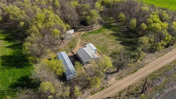 a view of backyard with green space