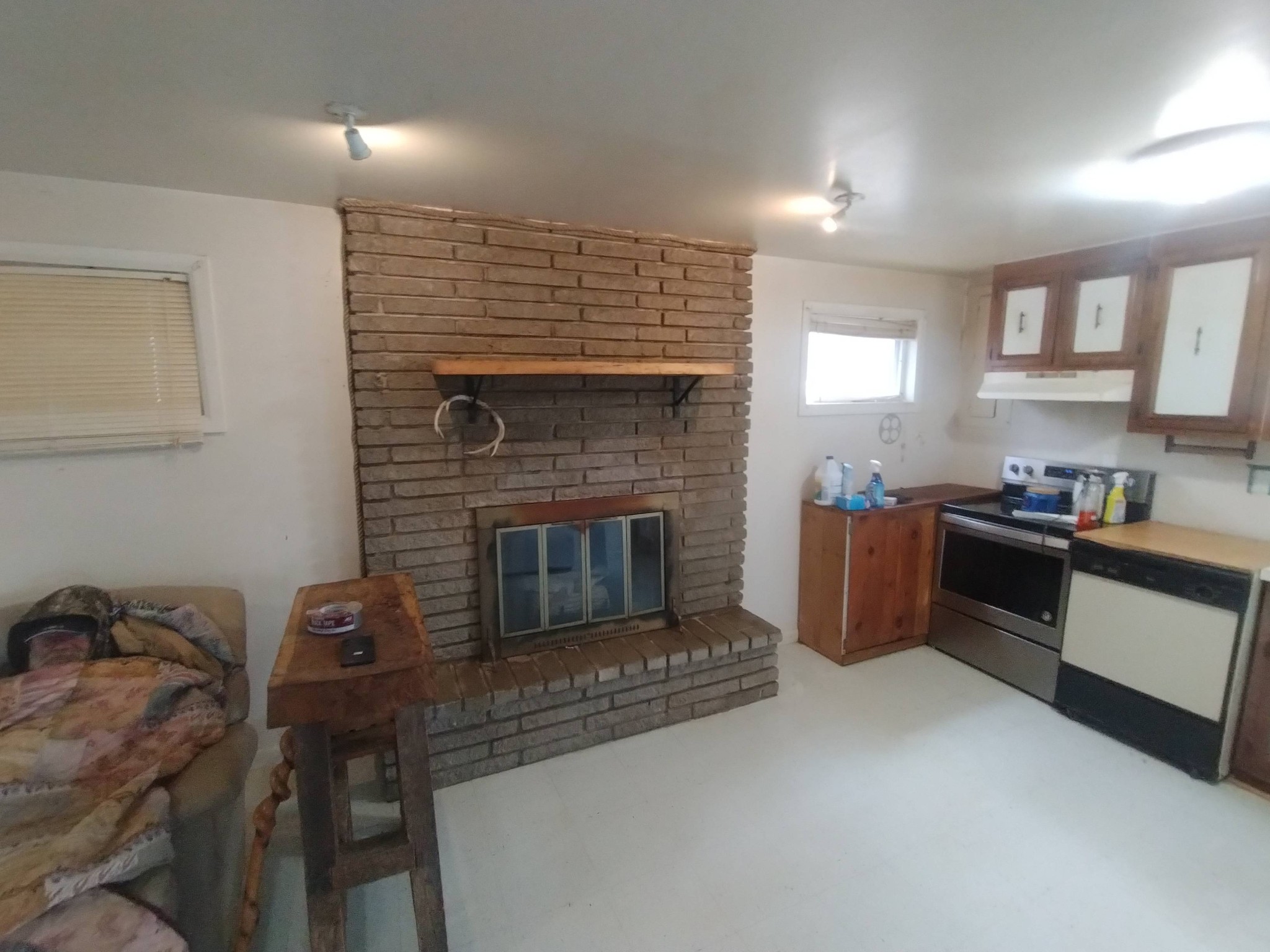 136 Riverside Drive Mount Juliet, TN 37122 - Photo 2 of 4 a living room with furniture and a fireplace
