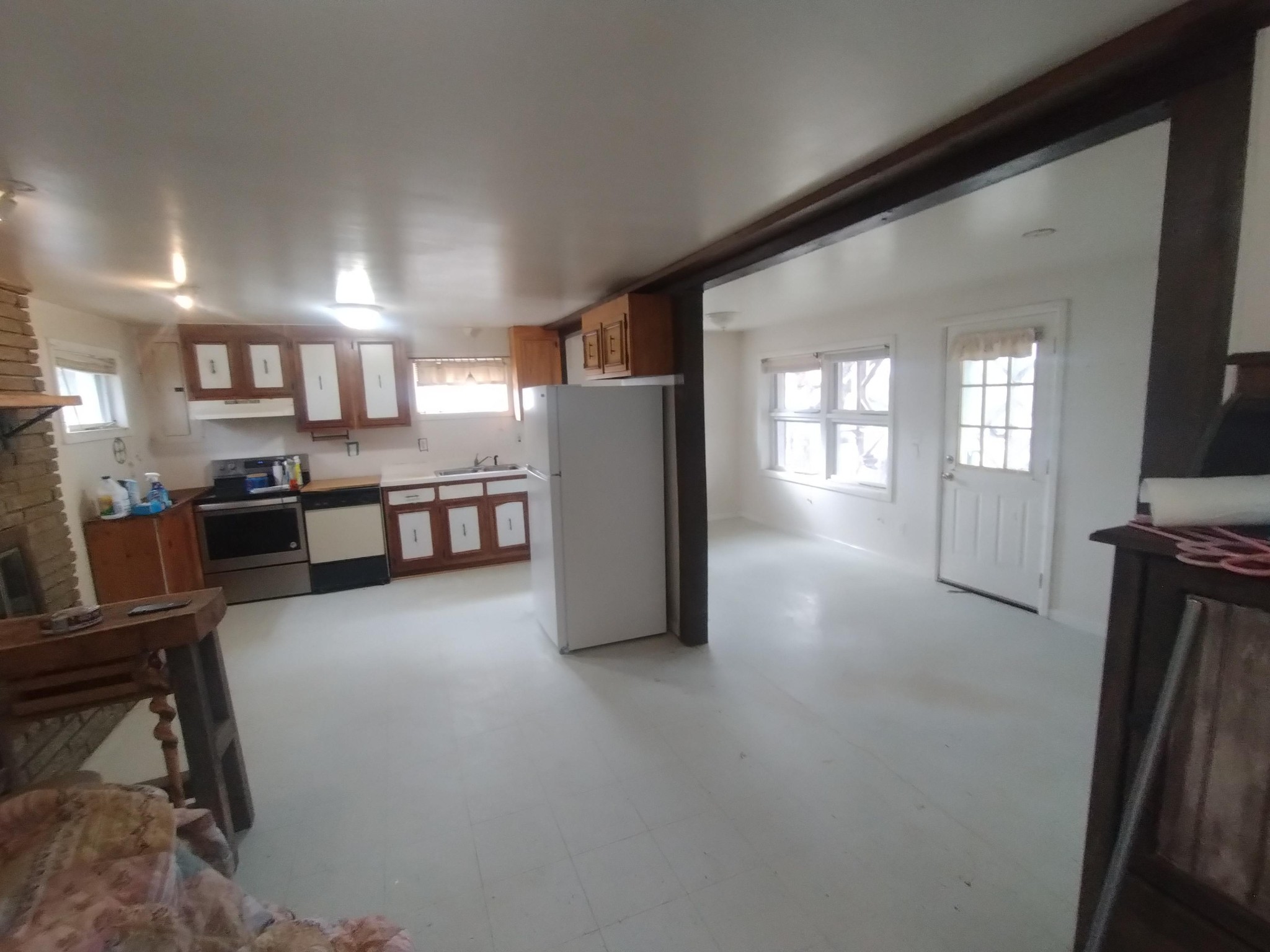 136 Riverside Drive Mount Juliet, TN 37122 - Photo 4 of 4 a kitchen with stainless steel appliances granite countertop a refrigerator a stove and a sink with large countertops