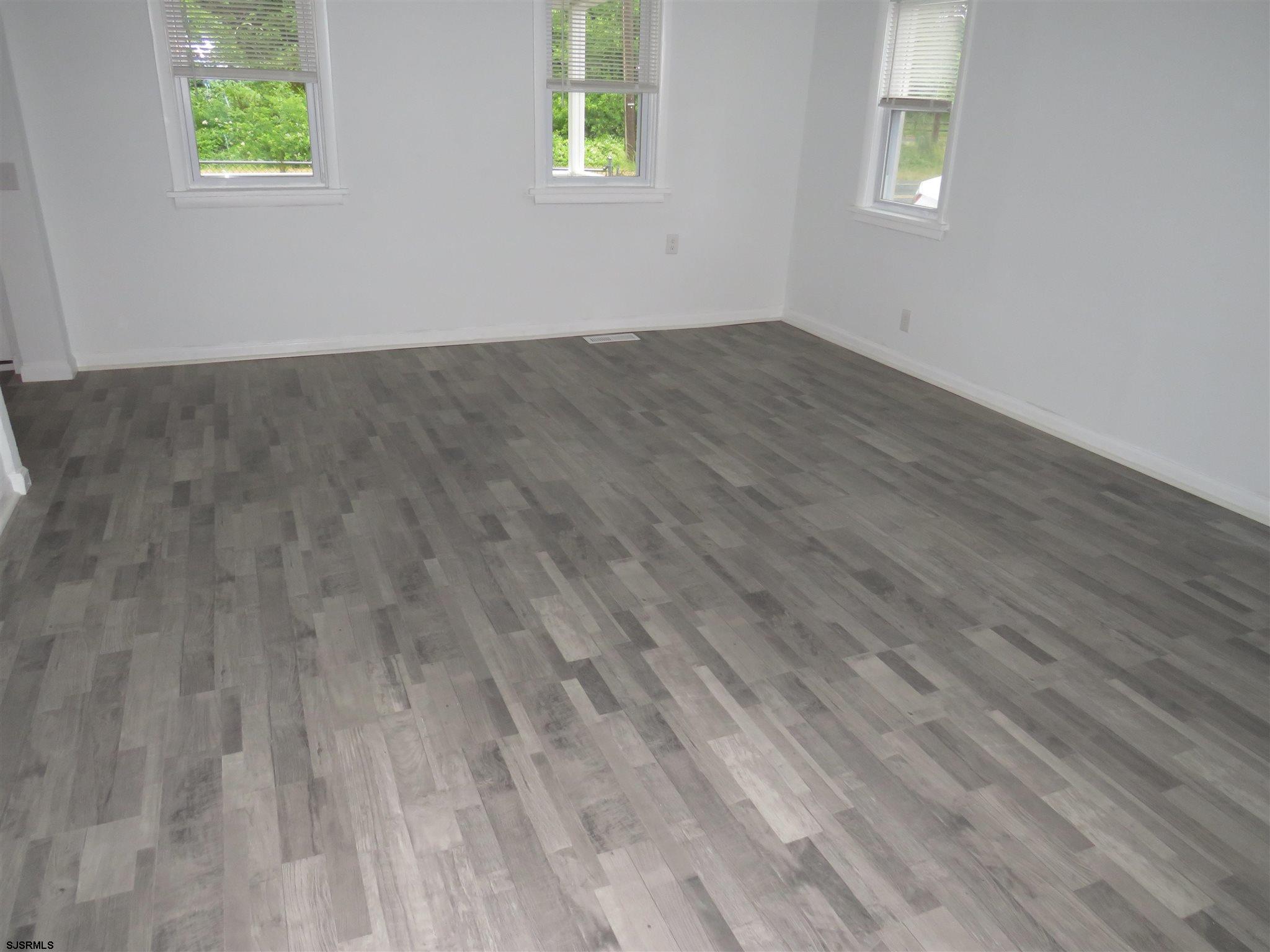 1702 Somers Point Road Egg Harbor Township, NJ 08234 - Photo 18 of 25 an empty room with windows