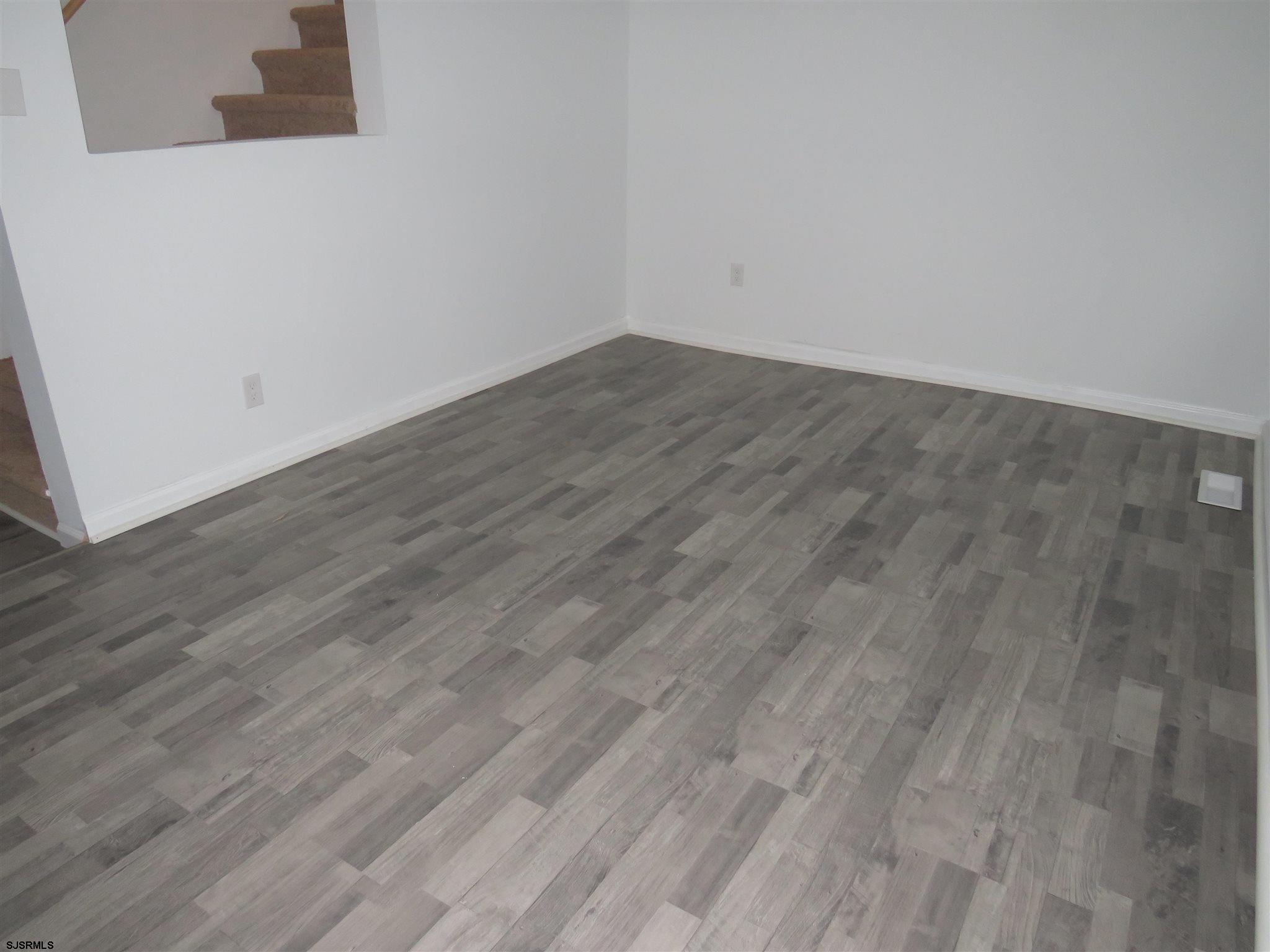 1702 Somers Point Road Egg Harbor Township, NJ 08234 - Photo 19 of 25 an empty room with wooden floor