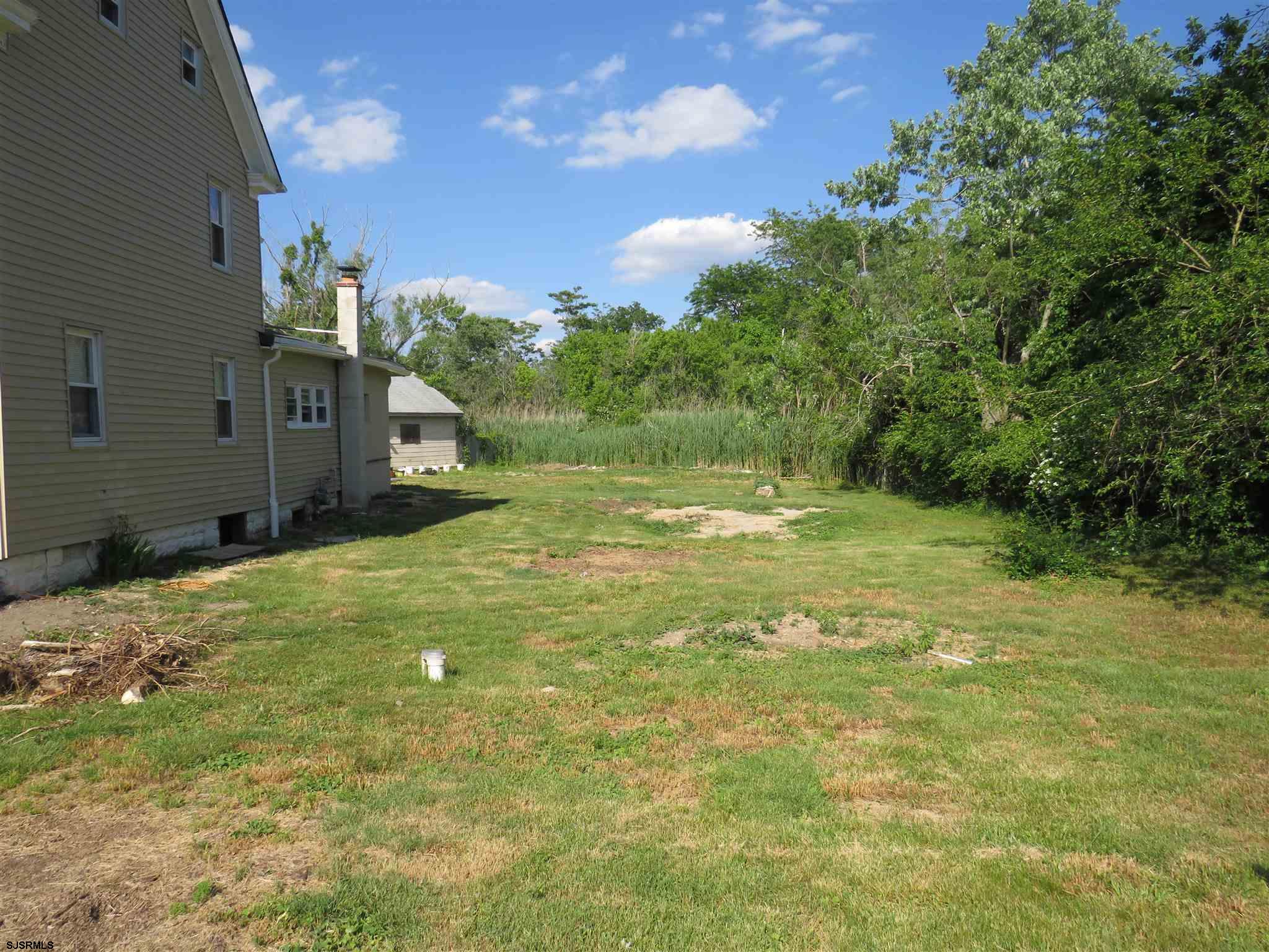 1702 Somers Point Road Egg Harbor Township, NJ 08234 - Photo 7 of 25 a view of a yard with an outdoor space