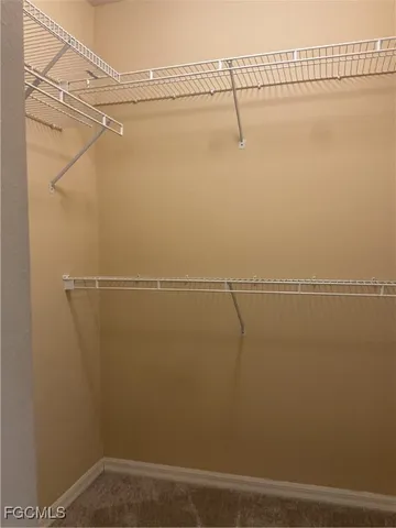 a view of a room with racks on the wall