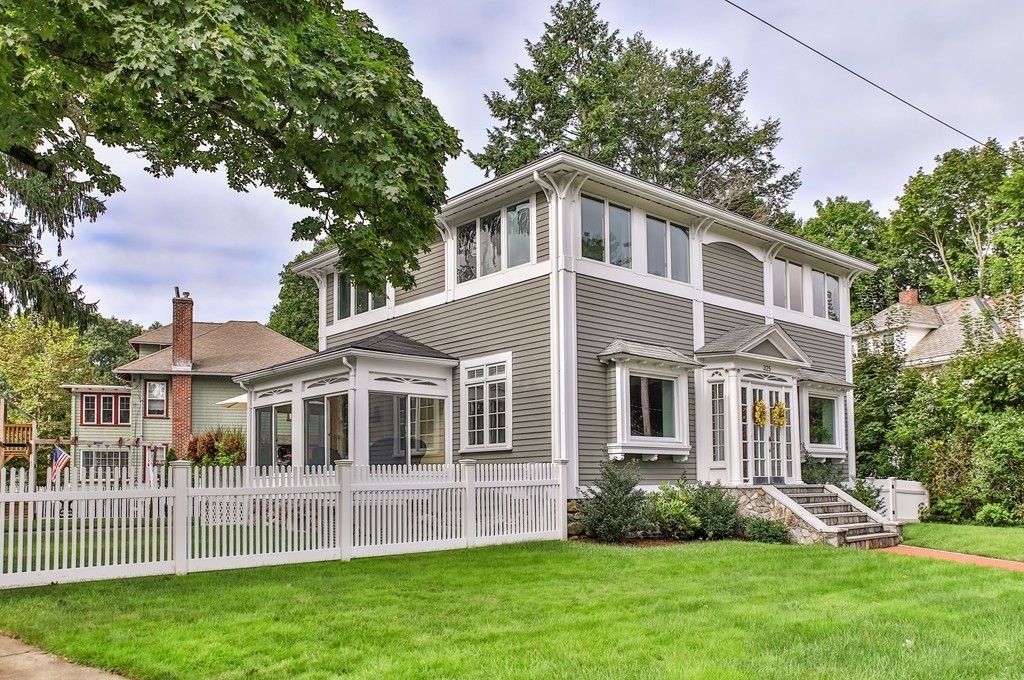 325 Reedsdale Road Milton, MA 02186 - Photo 1 of 23 a front view of a house with a yard