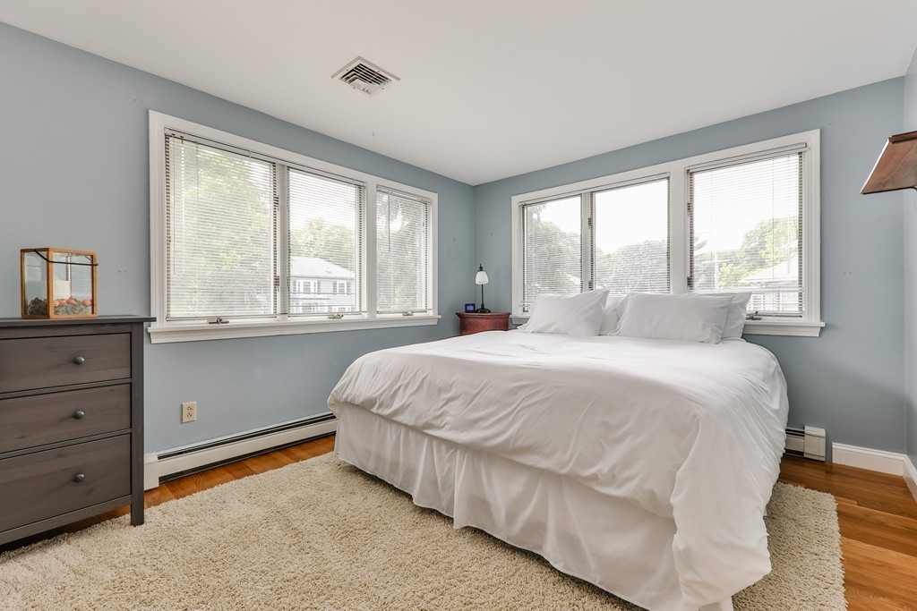 325 Reedsdale Road Milton, MA 02186 - Photo 14 of 23 a bedroom with a bed and window