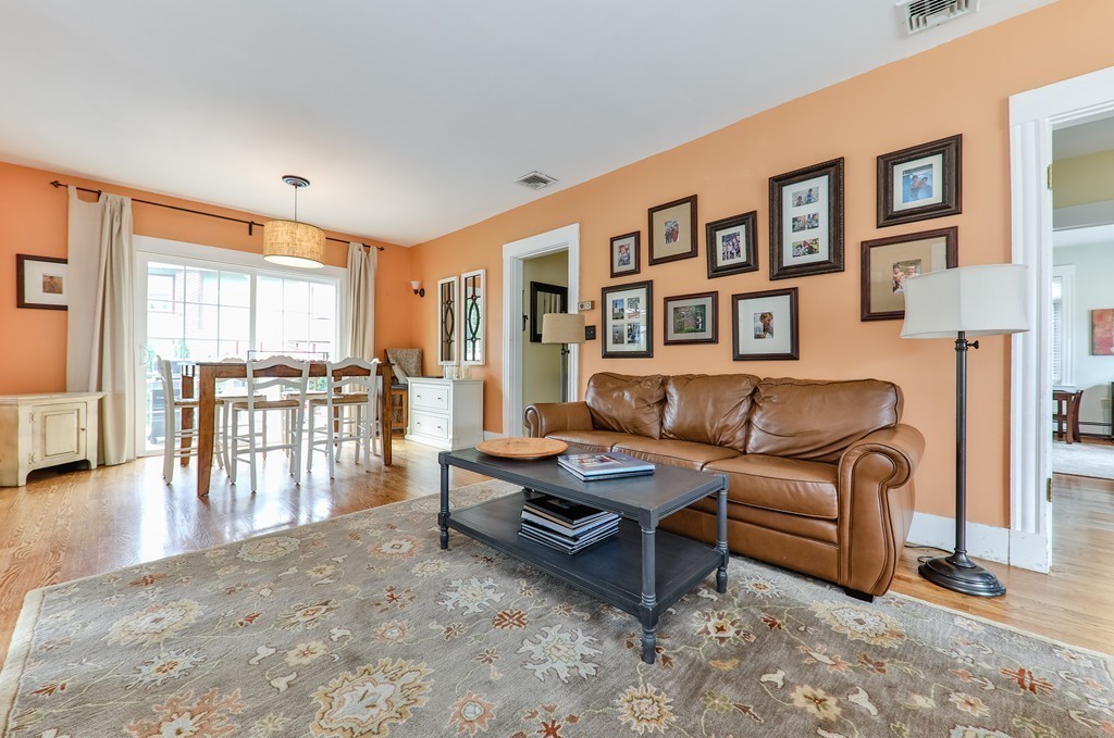 325 Reedsdale Road Milton, MA 02186 - Photo 4 of 23 a living room with furniture and large windows